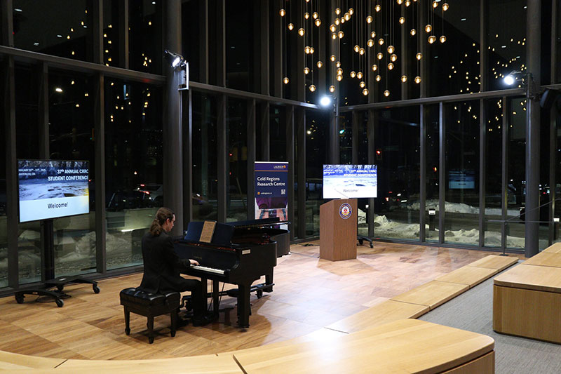 pianist plays at CRRC conference opening night